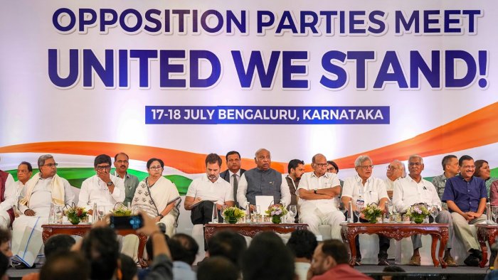 Congress President Mallikarjun Kharge, party leader Rahul Gandhi, West Bengal CM Mamata Banerjee, Delhi CM Arvind Kejriwal, NCP supremo Sharad Pawar and others at a press conference in Bengaluru on July 18, where the opposition parties named their new alliance I.N.D.I.A. Credit: PTI Photo Congress President Mallikarjun Kharge, party leader Rahul Gandhi, West Bengal CM Mamata Banerjee, Delhi CM Arvind Kejriwal, NCP supremo Sharad Pawar and others at a press conference in Bengaluru on July 18, where the opposition parties named their new alliance I.N.D.I.A. Credit: PTI Photo