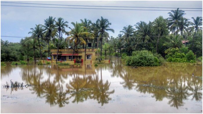 A waterlogged area following heavy monsoon rains in Udupi district. Credit: PTI Photo A waterlogged area following heavy monsoon rains in Udupi district. Credit: PTI Photo
